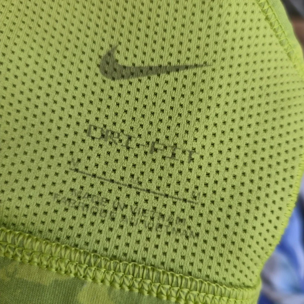 Nike Women's Dri-FIT Indy Icon Clash Sports Bra Light Support Green Print Medium